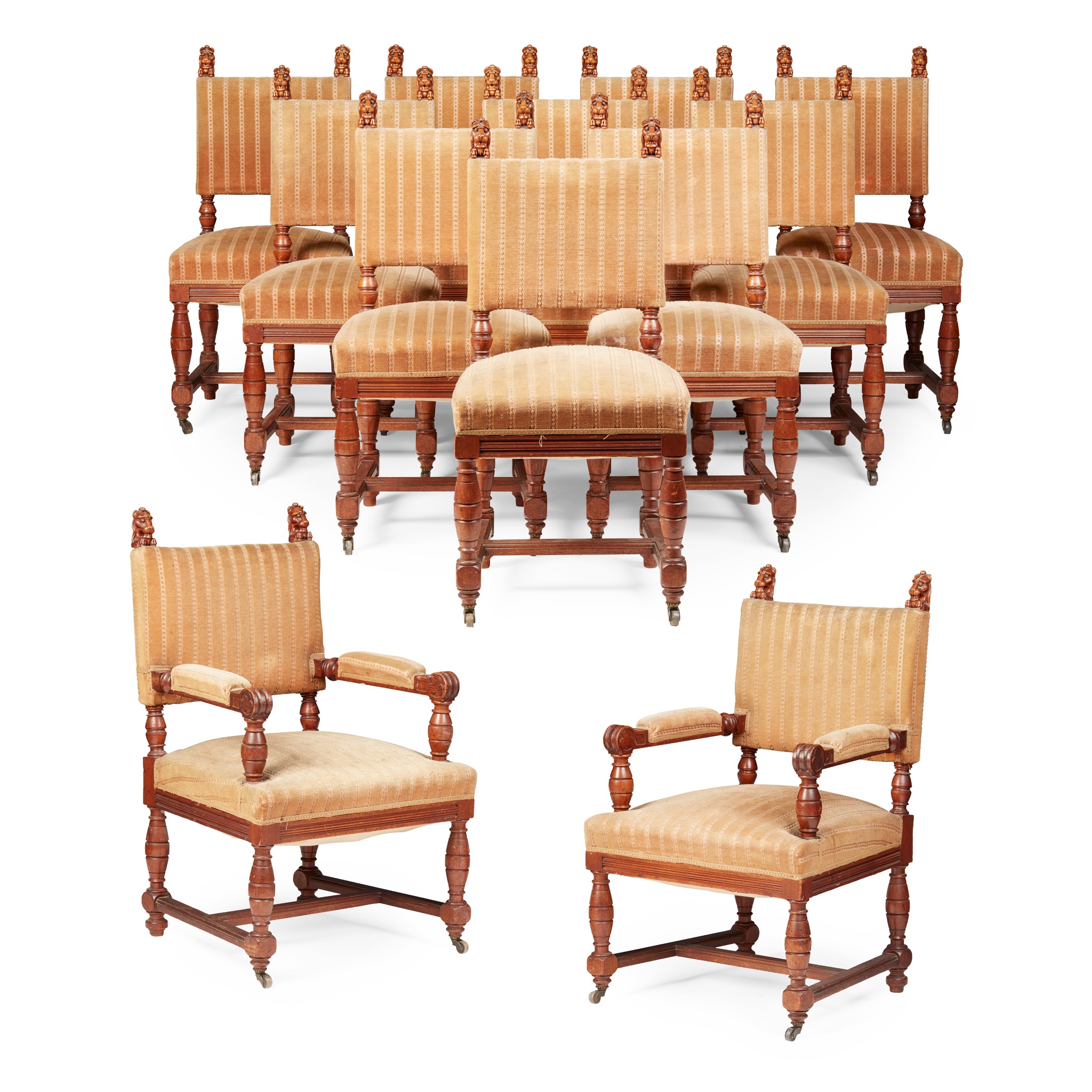 SET OF TWELVE CARVED OAK DINING CHAIRS