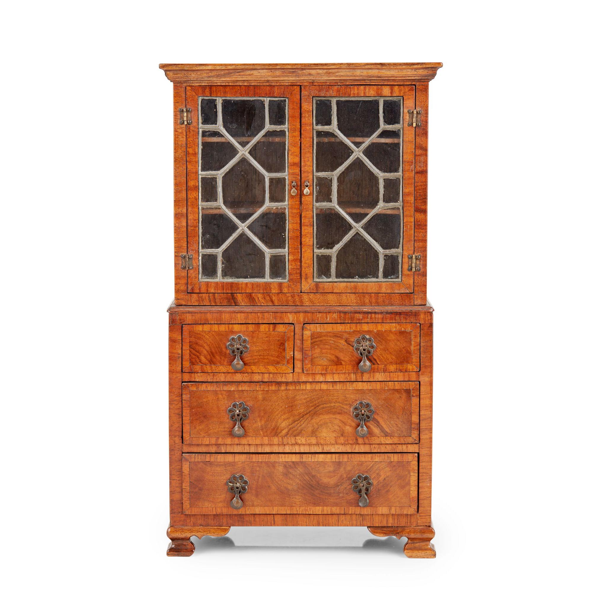 MINIATURE GEORGE II STYLE WALNUT BOOKCASE-ON-CHEST