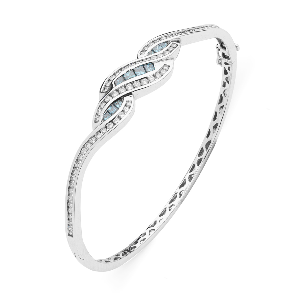 A contemporary blue and colourless diamond set bangle
