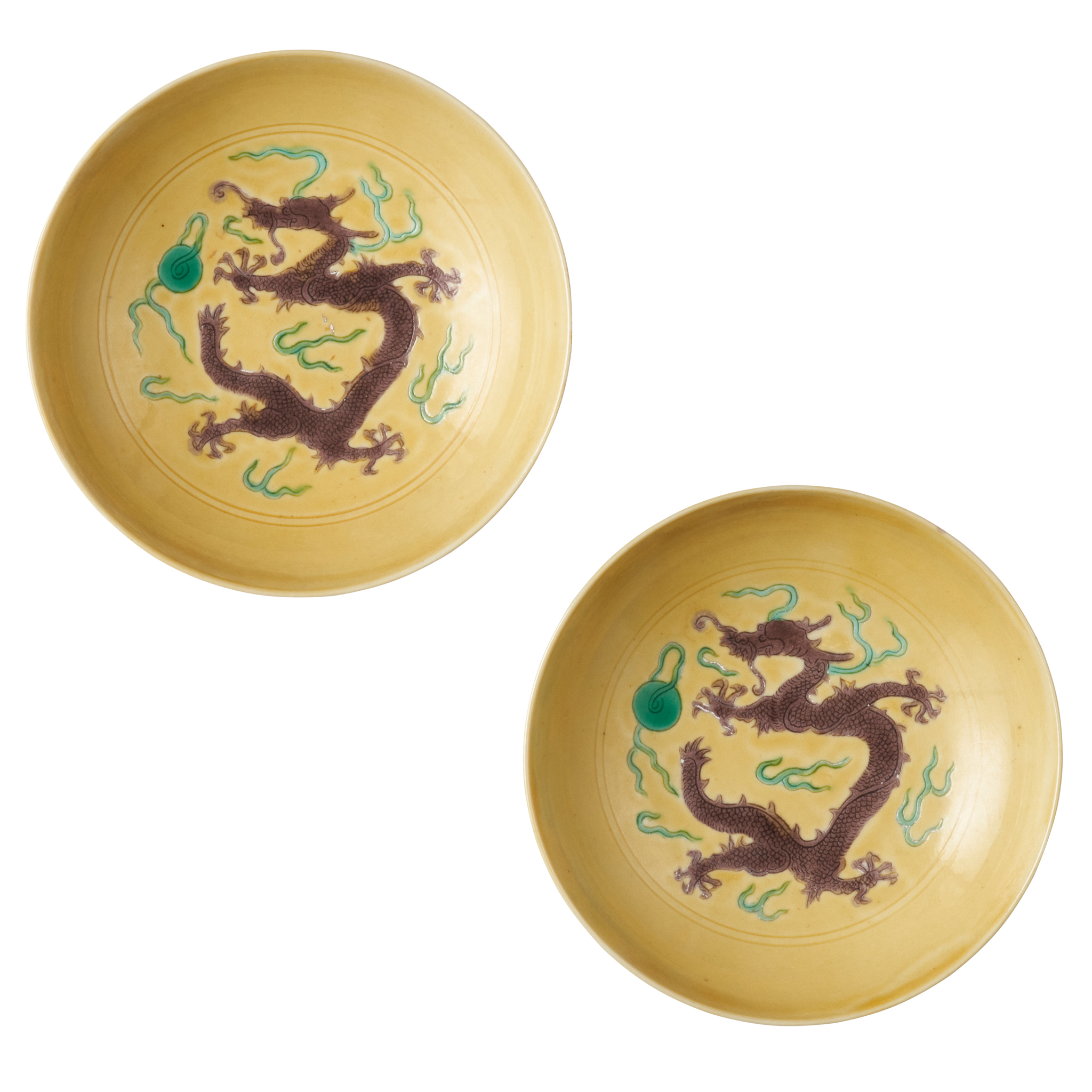 PAIR OF YELLOW-GROUND AUBERGINE-AND GREEN ENAMELLED 'DRAGON' SAUCERS