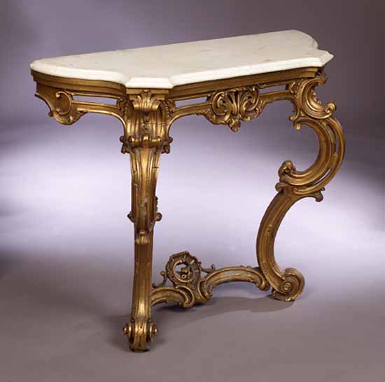 A carved and giltwood console table