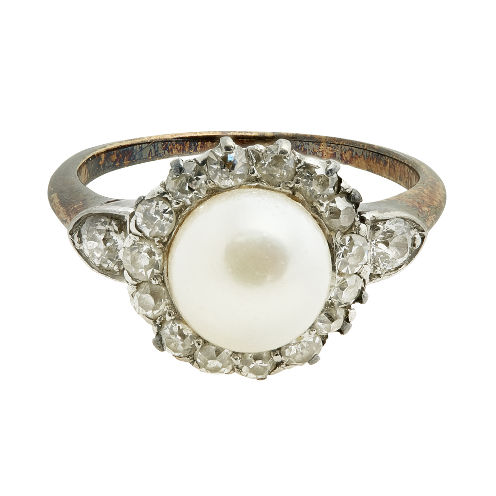 A pearl and diamond set cluster ring
