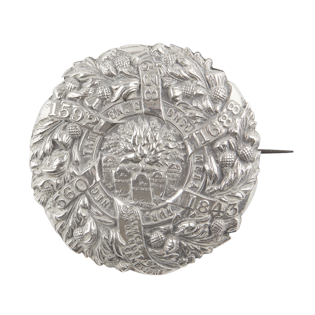 A 'DISRUPTION' BROOCH