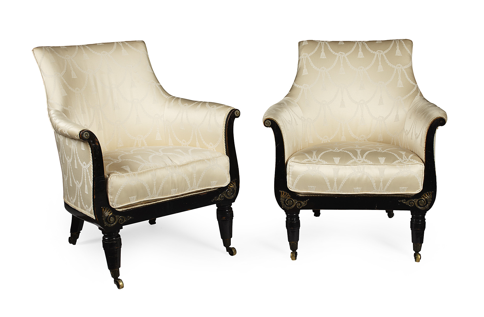 PAIR OF REGENCY EBONISED AND UPHOLSTERED LIBRARY CHAIRS