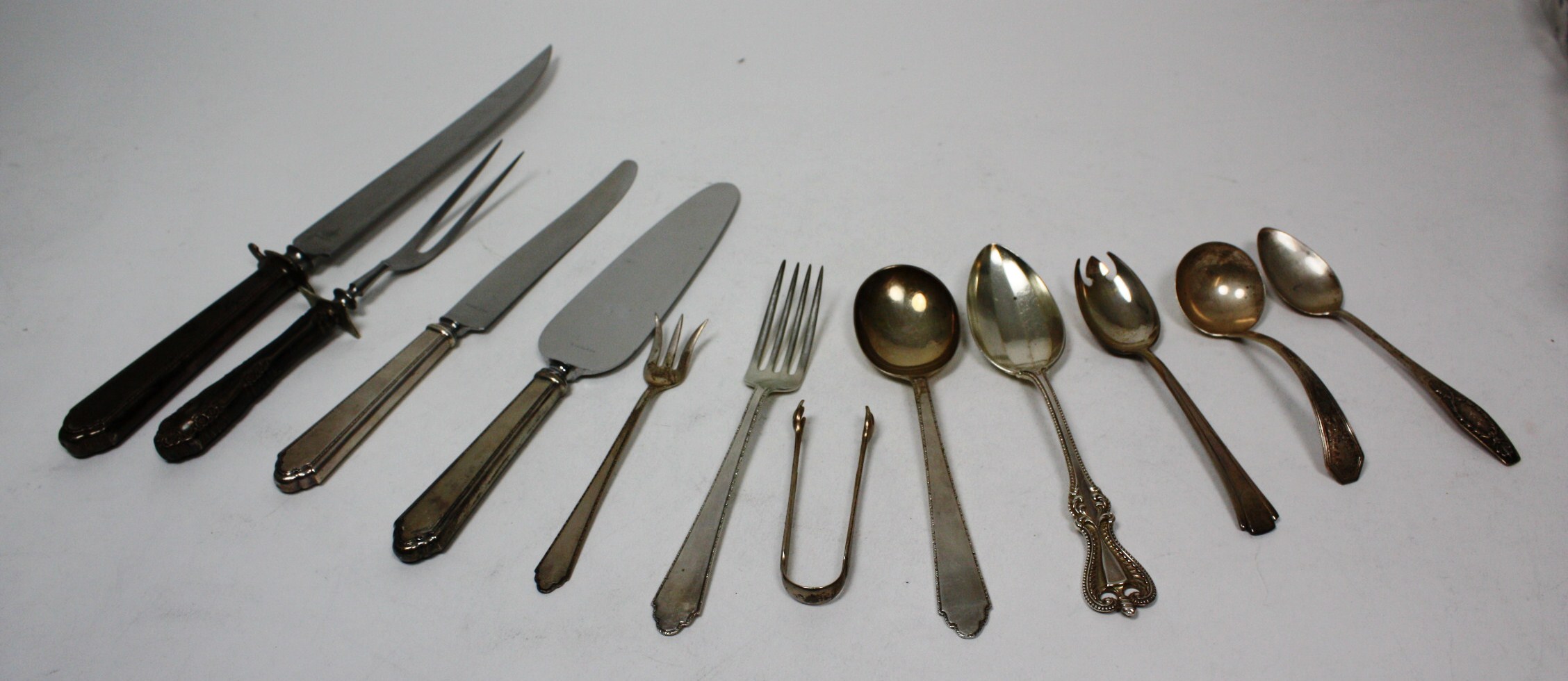 A large group of American flatware