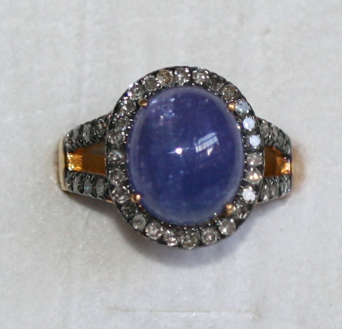 A sapphire and diamond set cluster ring