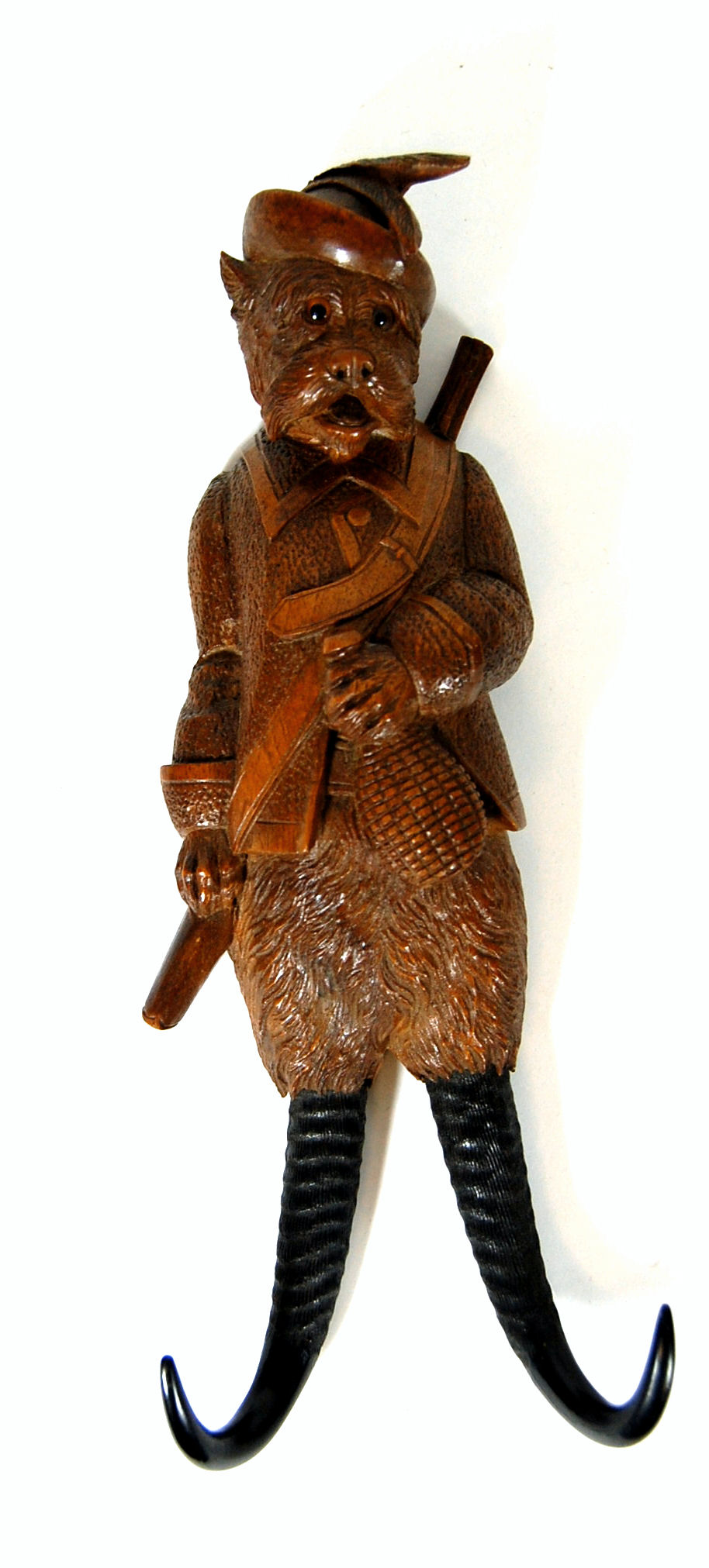 A 19th century novelty Black Forest carved coat hook