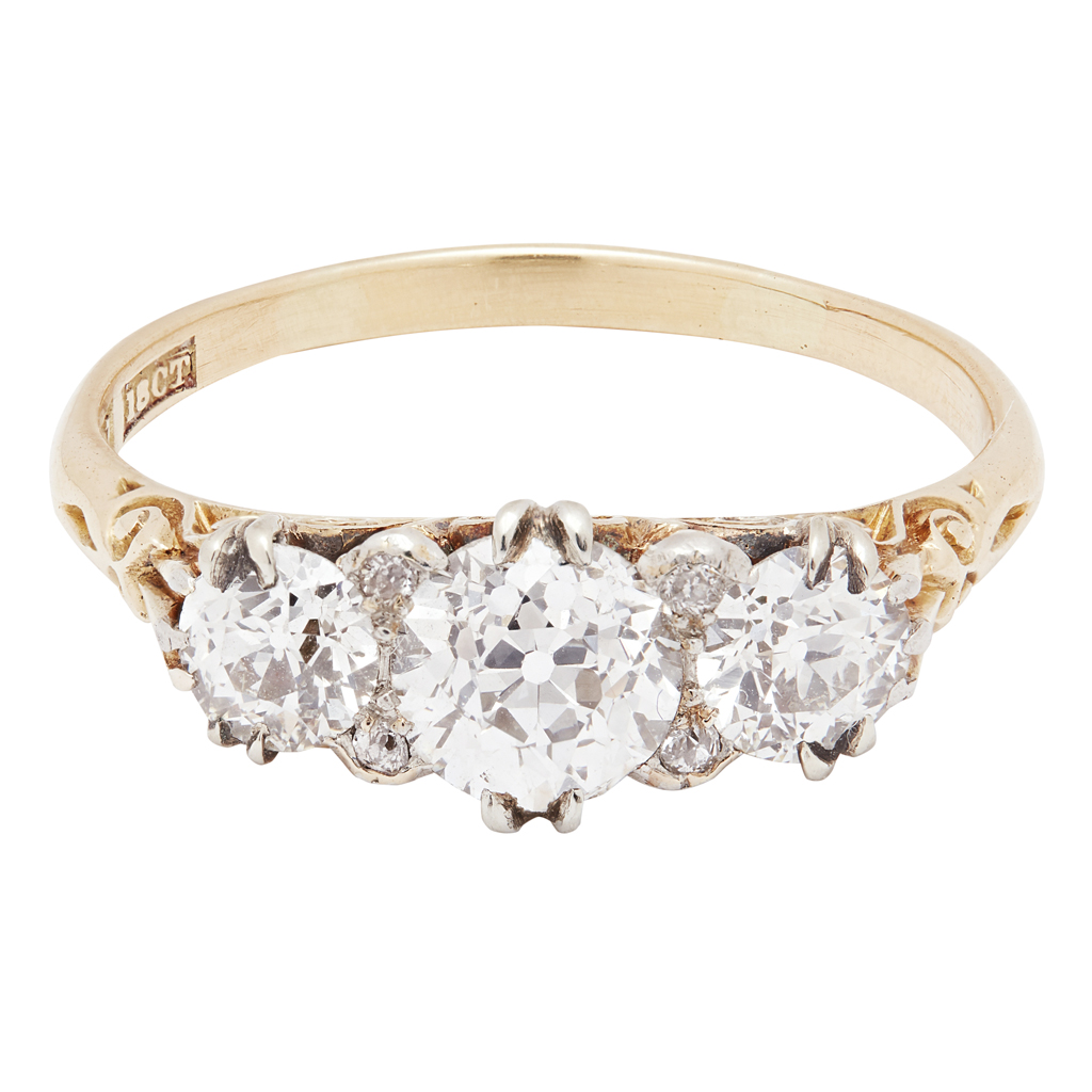 A three stone diamond set ring