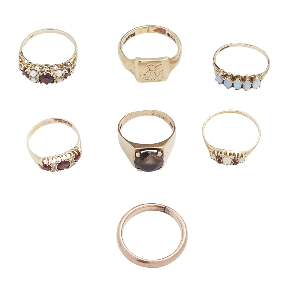 A collection of 9ct gold gem set rings
