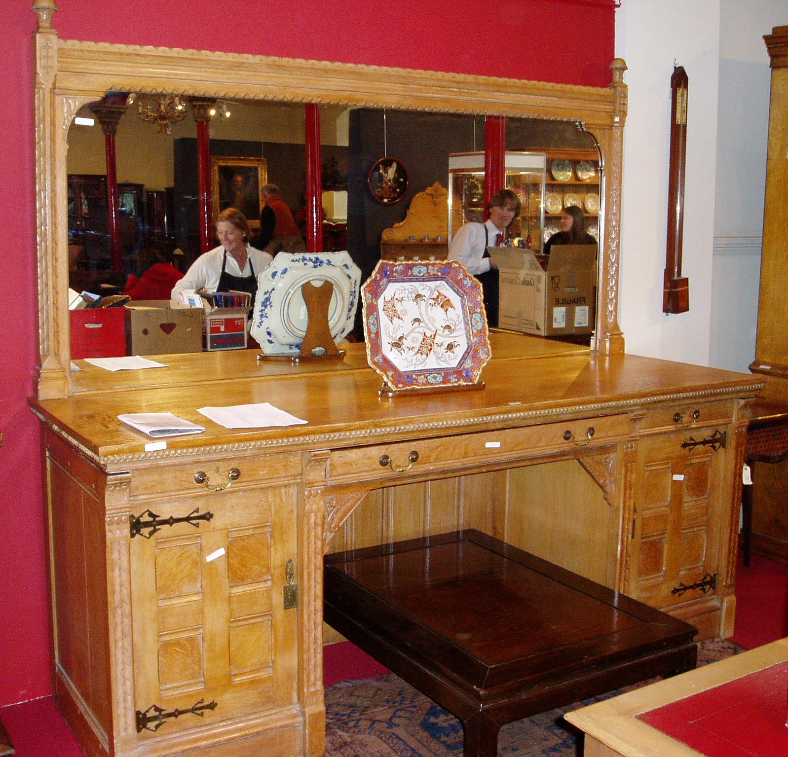 A Gothic style oak mirror backed sideboard,