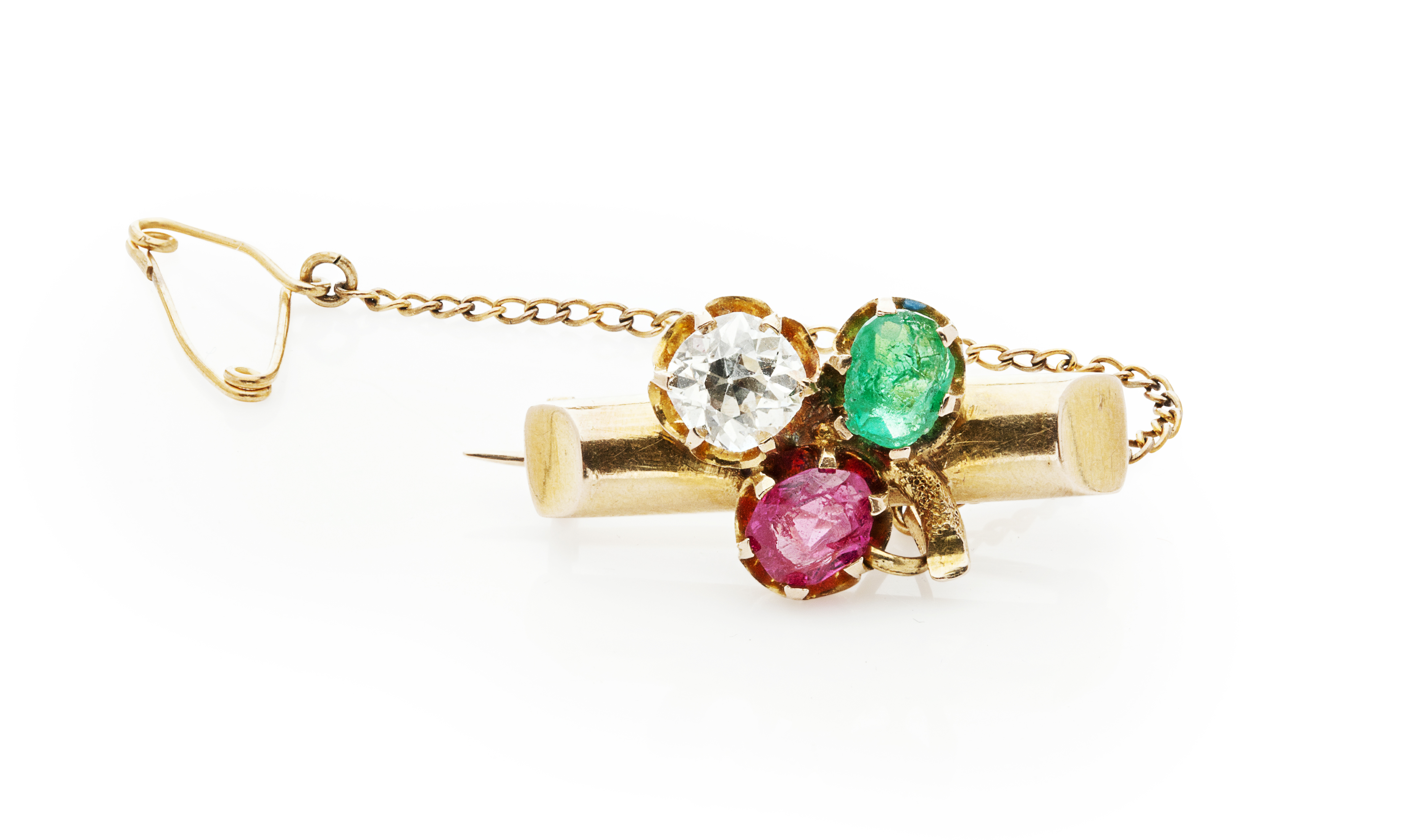 A diamond, emerald and ruby set brooch