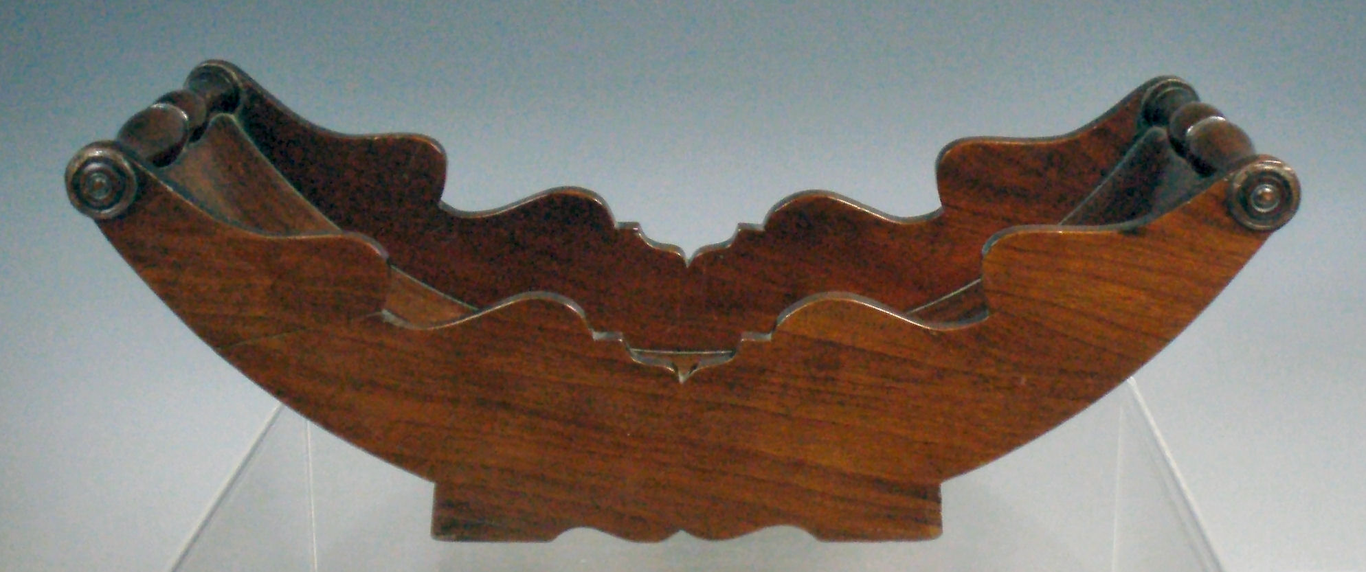 An early 19th century mahogany cheese coaster