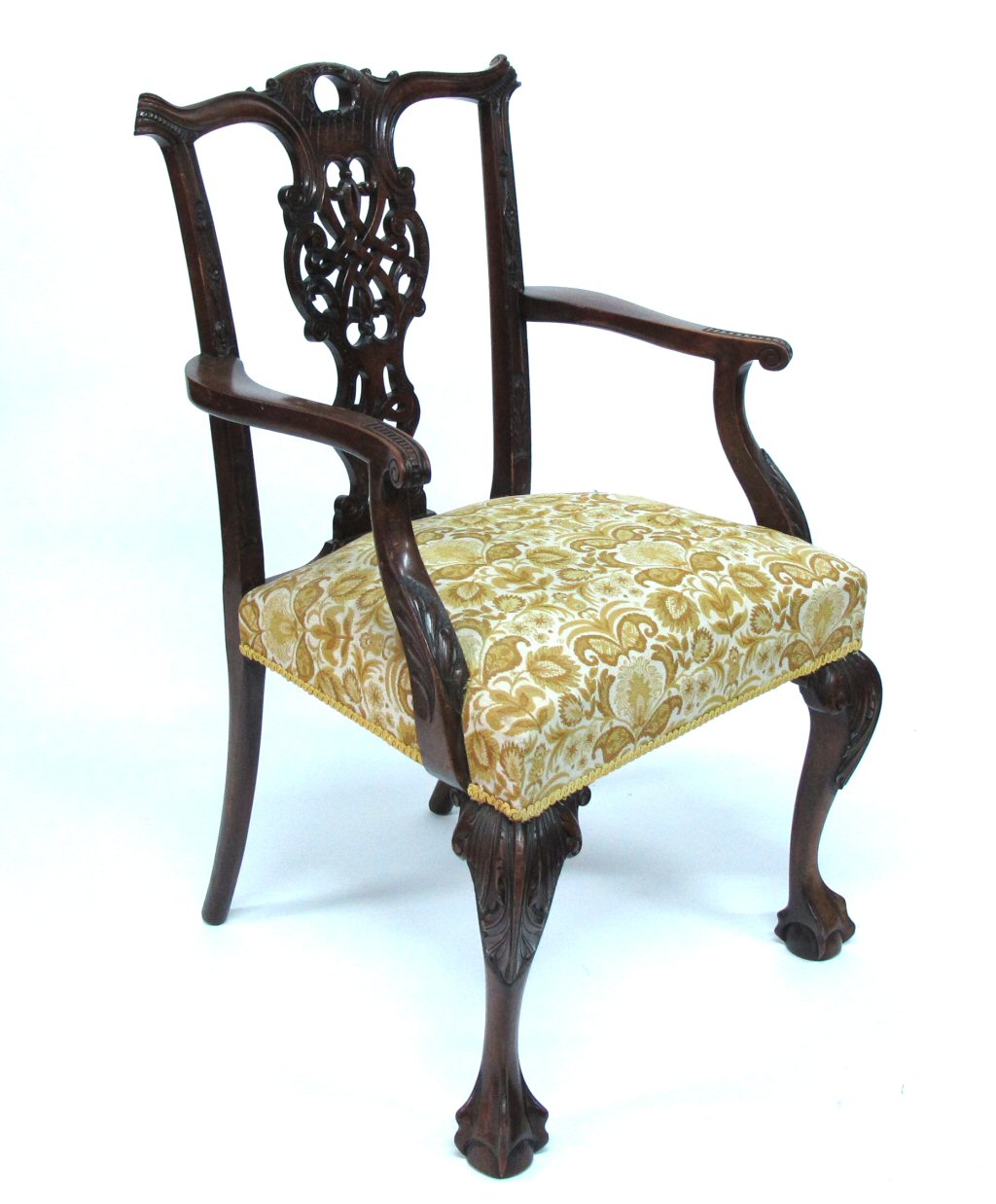 A 19th century Chippendale style mahogany open arm chair
