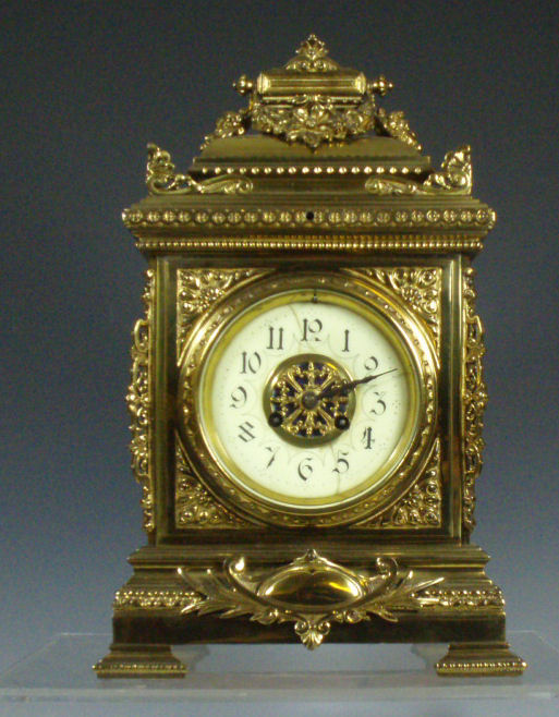 A gilt brass Victorian mantel clock