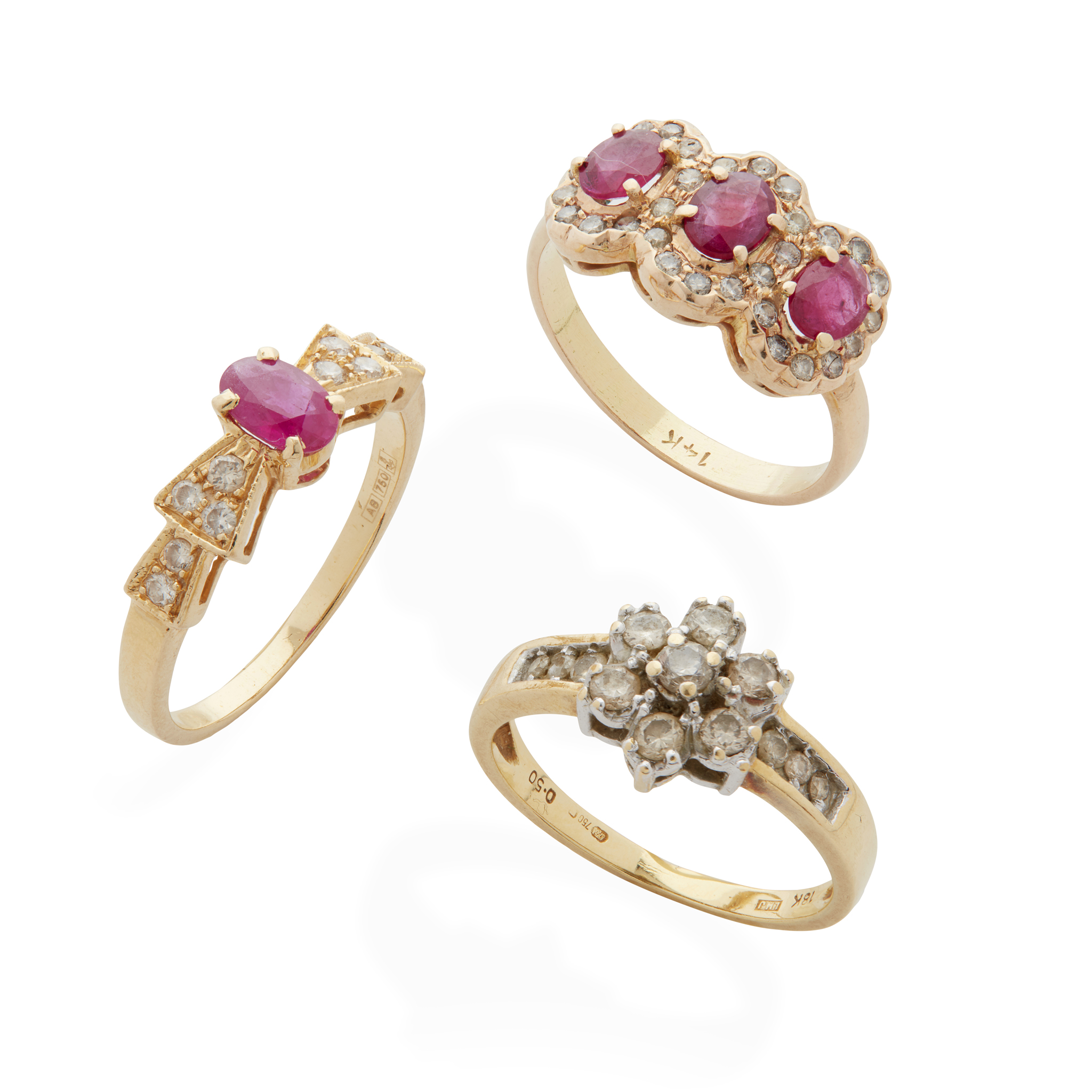 A collection of ruby and diamond rings