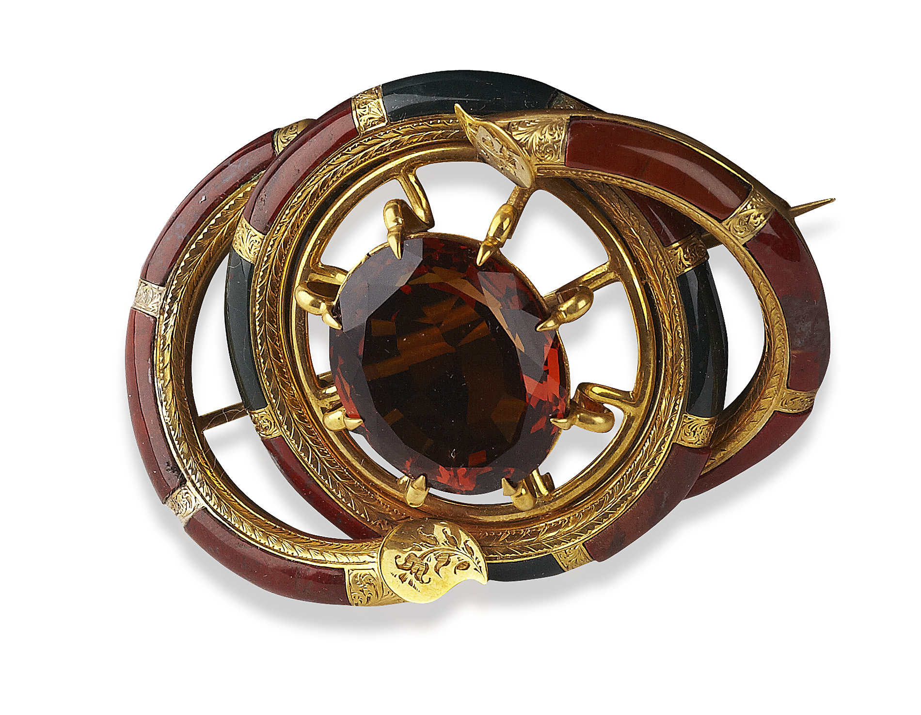 A mid-Victorian gold mounted hardstone brooch