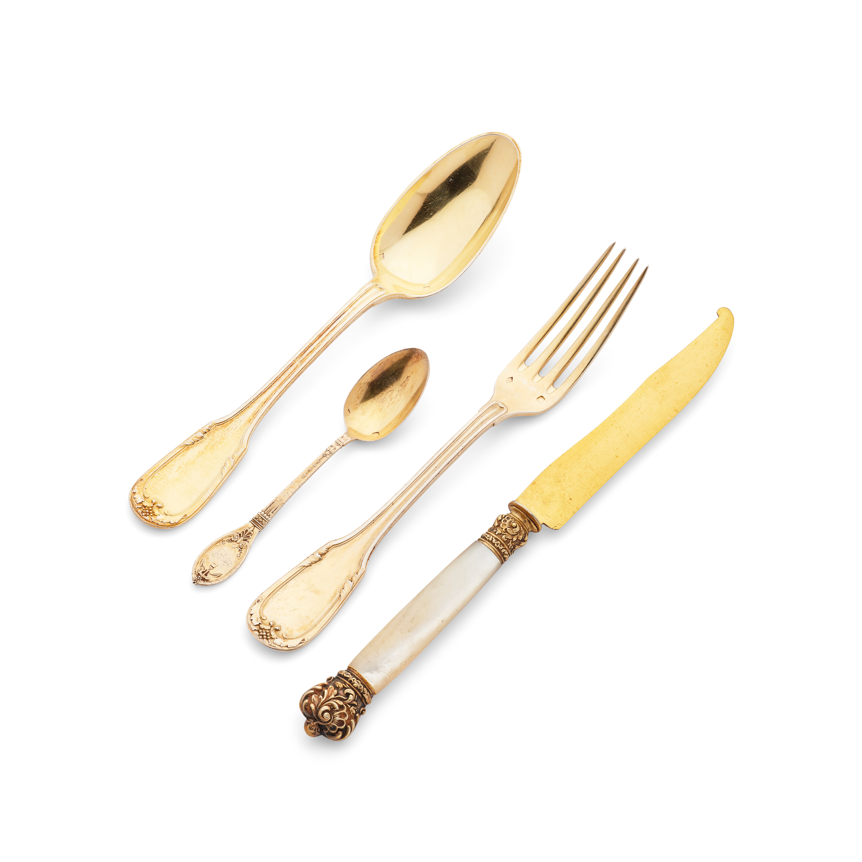 A COLLECTION OF FRENCH SILVER-GILT DESSERT FLATWARE