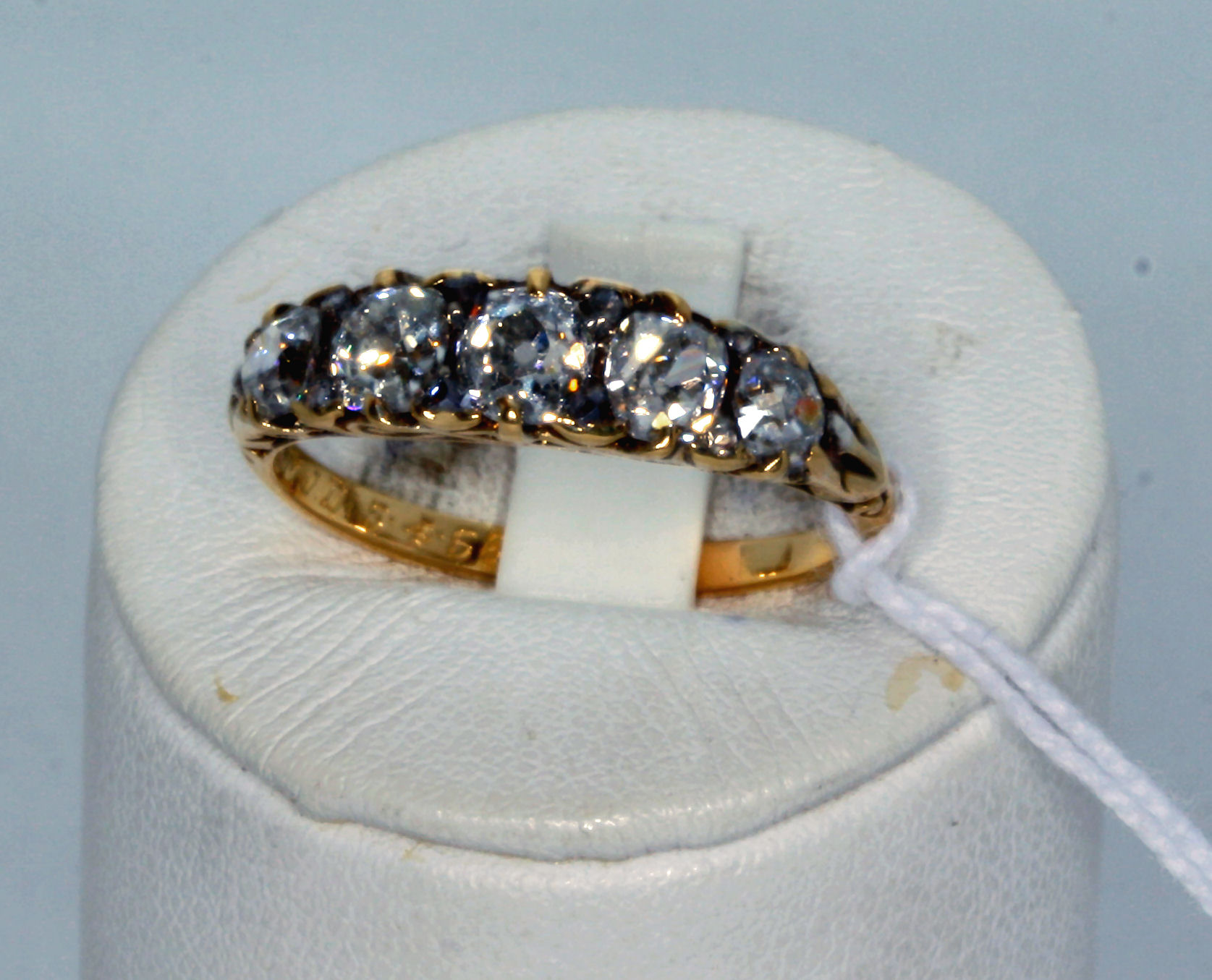 A Victorian 18ct gold mounted five-stone diamond ring,