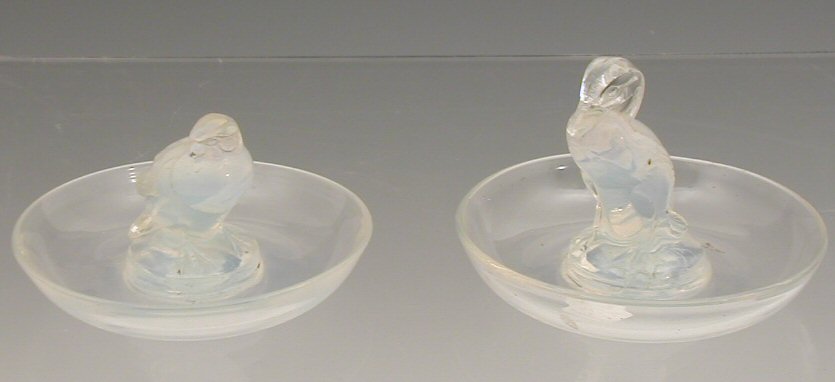 Two Lalique opalescent glass ashtrays,
