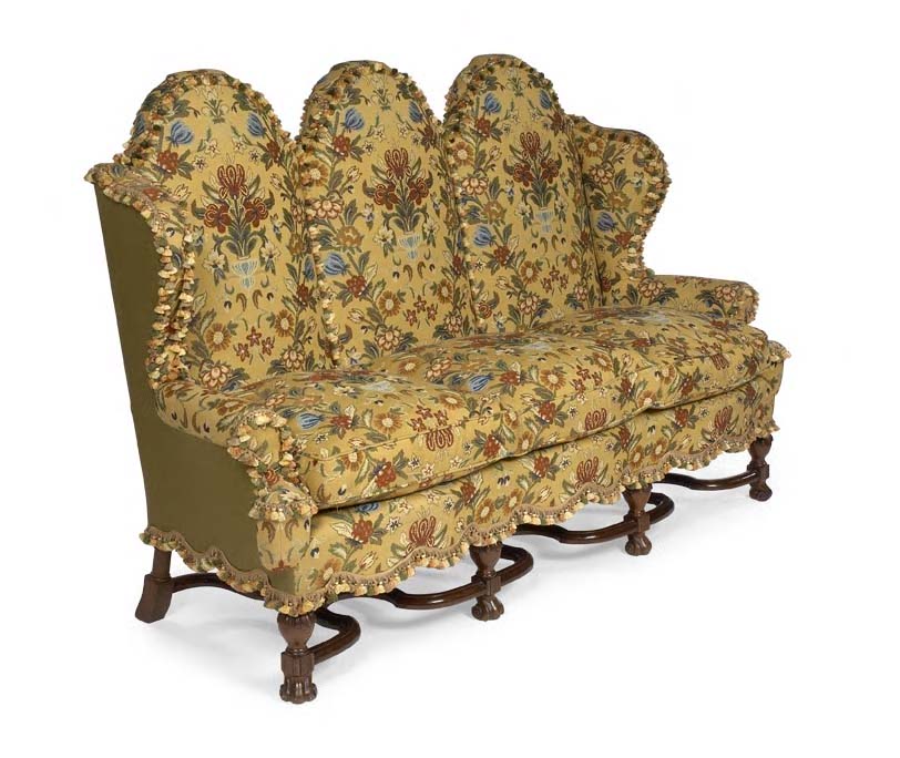 A 19th century walnut framed triple chair back settee