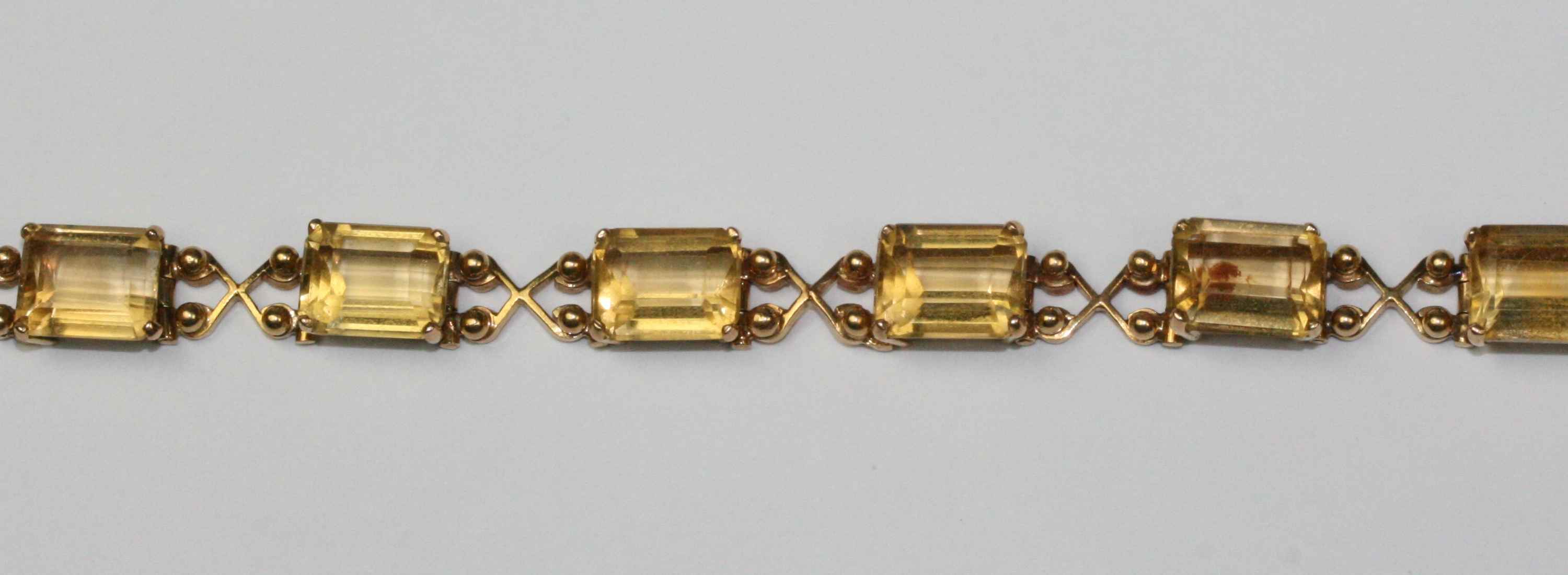 A citrine and gold bracelet