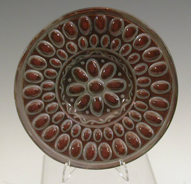 A William de Morgan circular dish,