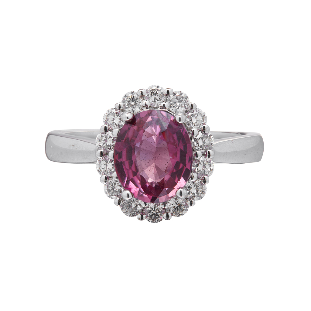 A pink sapphire and diamond set cluster ring