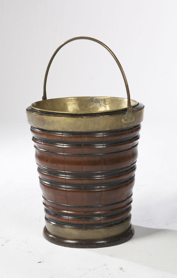 An early 19th century Dutch mahogany and ebonised bucket
