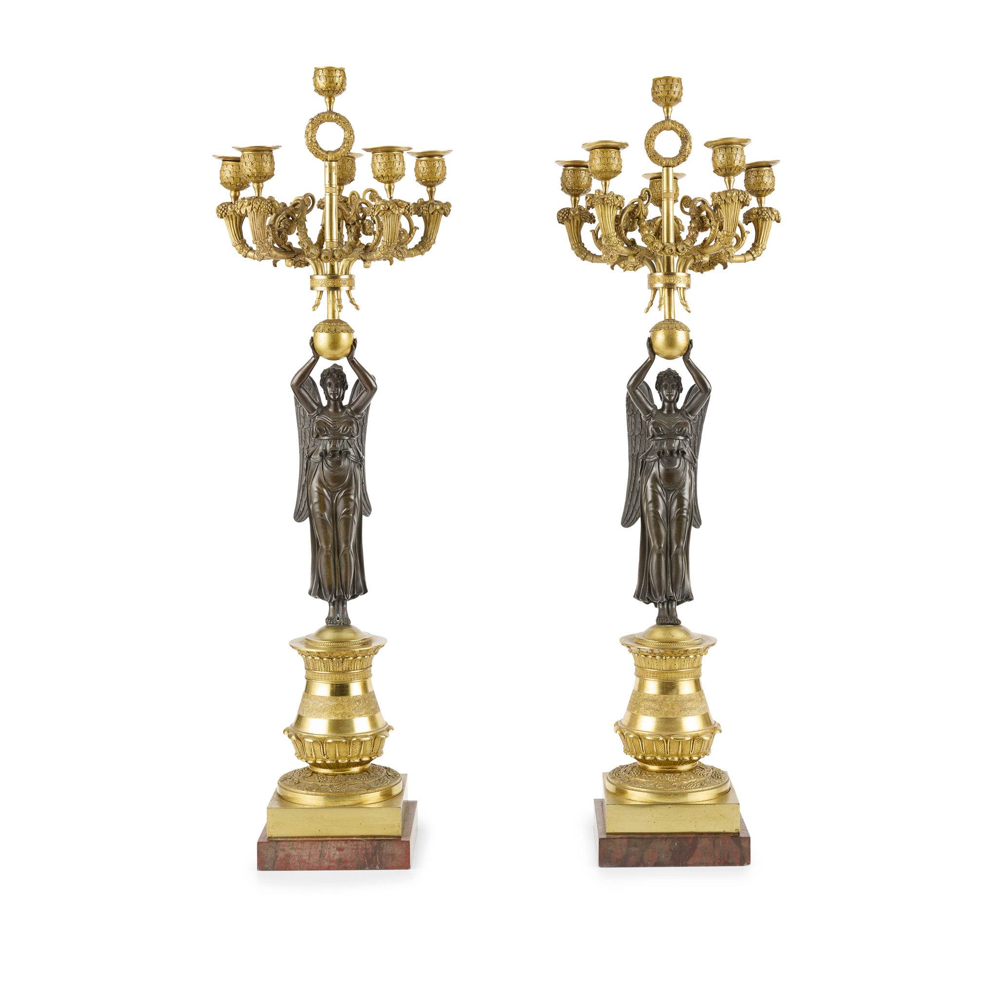 PAIR OF EMPIRE STYLE GILT AND PATINATED BRONZE FIGURAL CANDELABRA, IN THE MANNER OF PIERRE-PHILIPPE THOMIRE