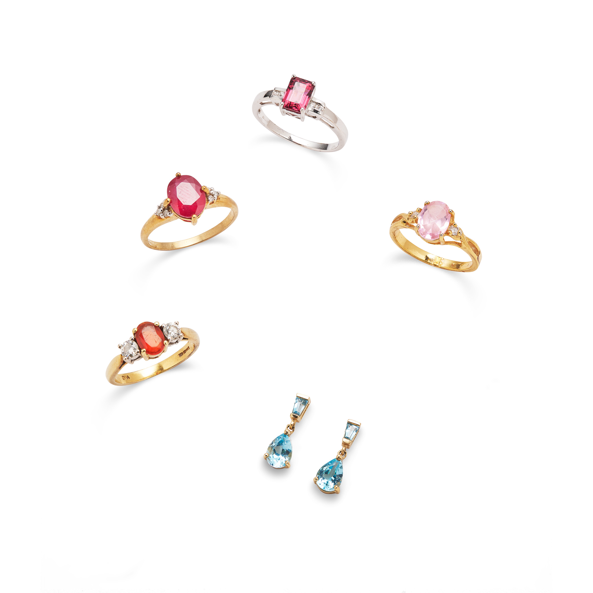 A collection of gem set rings and earrings