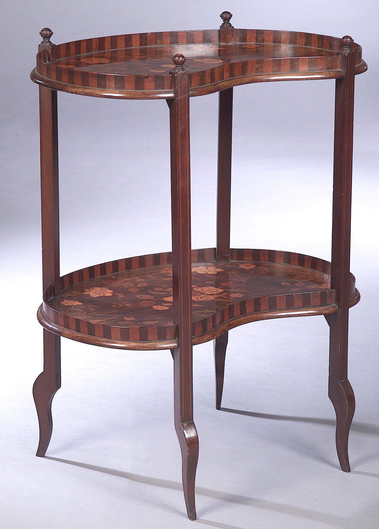 An Edwardian marquetry mahogany etagere