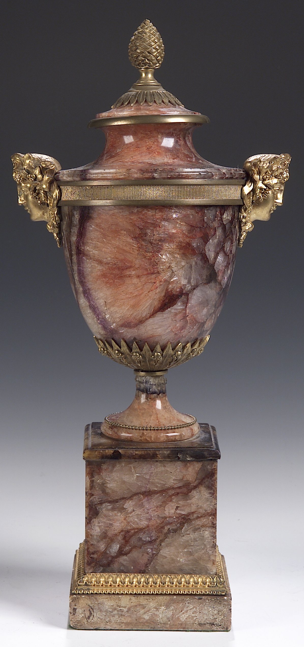 A Regency ormolu mounted blue john vase on a plinth