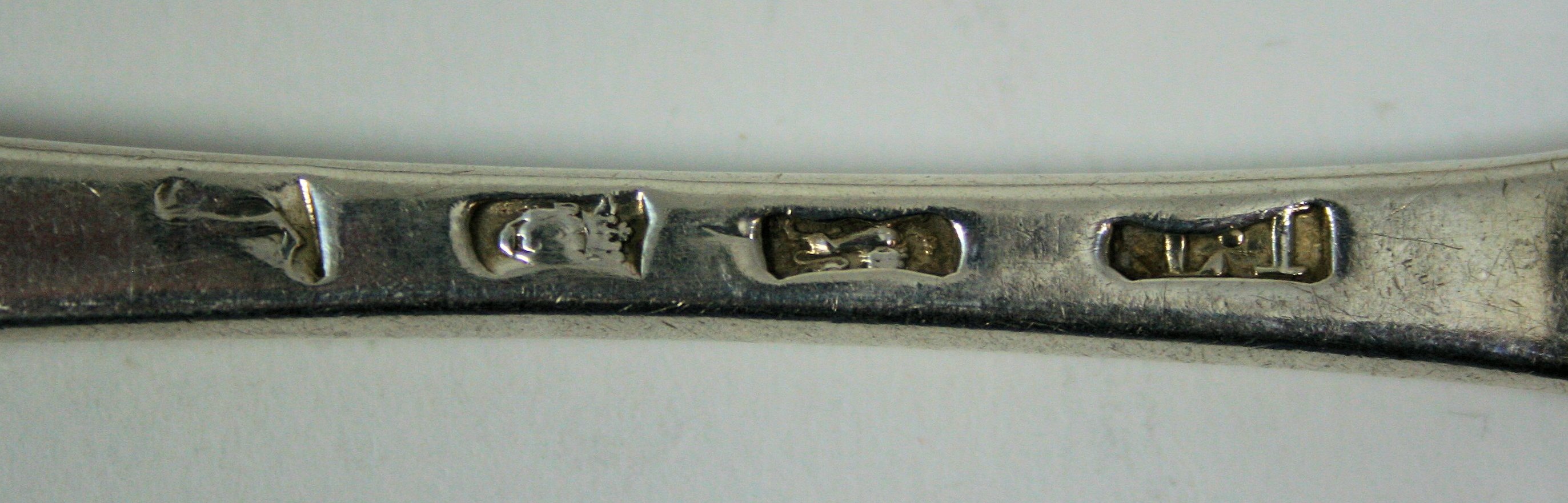 A matched set of six George II table spoons