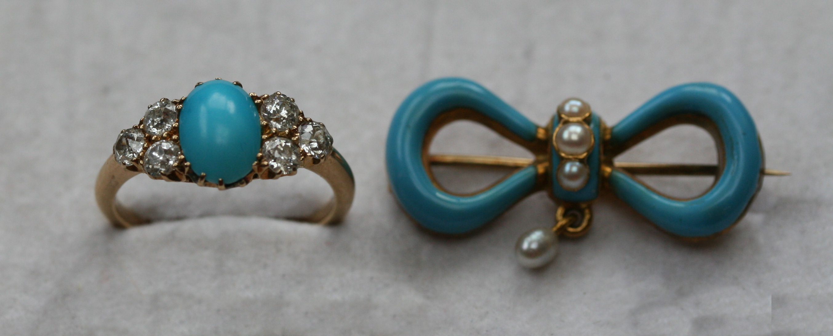A diamond and turquoise set ring