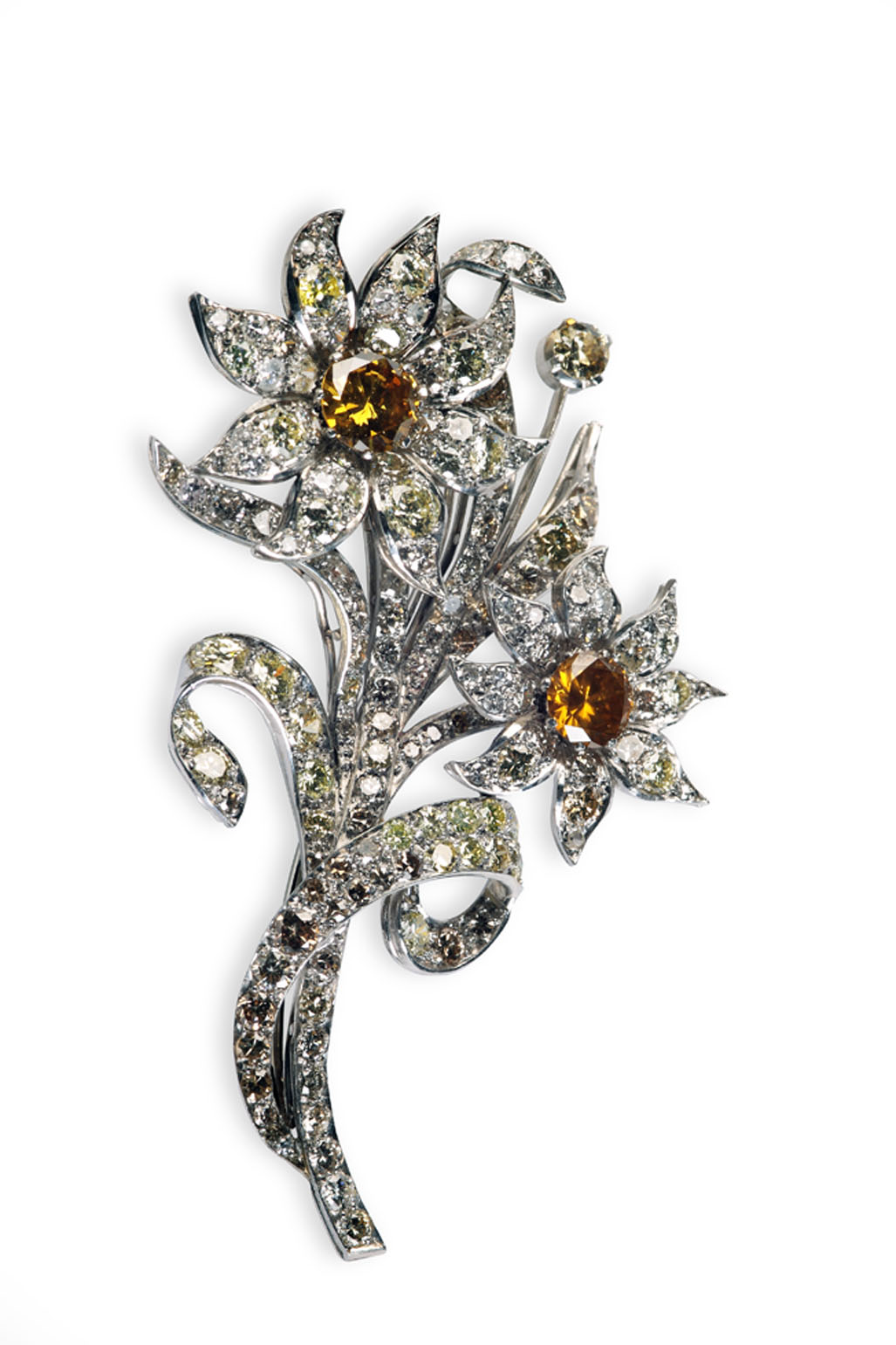 A fancy yellow and colourless diamond set brooch,
