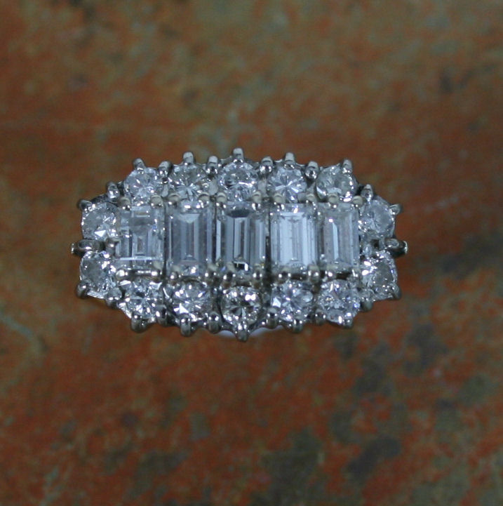 An 18ct gold mounted diamond cluster ring,