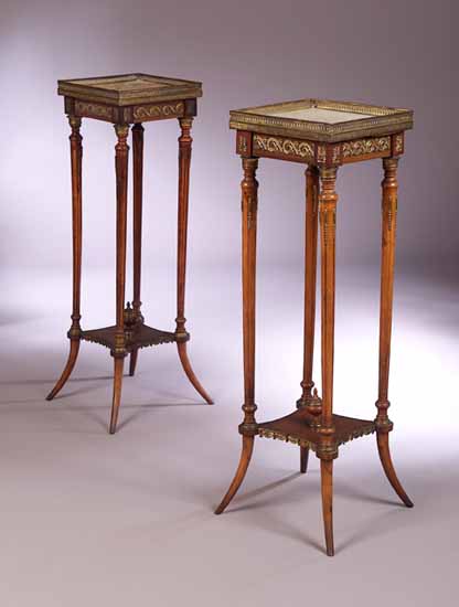 A pair of gilt bronze pedestals