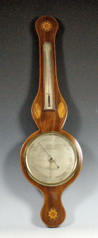 A late 19th century mahogany banjo barometer by G. Plossi, Norwich