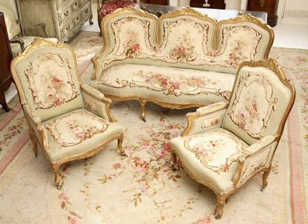 A 19th century French giltwood and upholstered salon suite