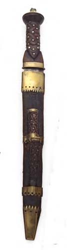 A late 17th/early 18th century brass mounted dirk,