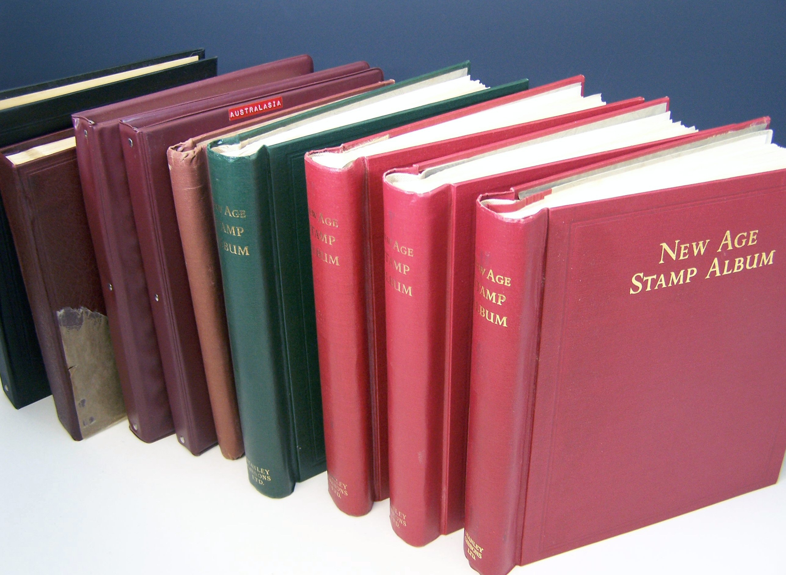 All world collection, a group of stamp albums,