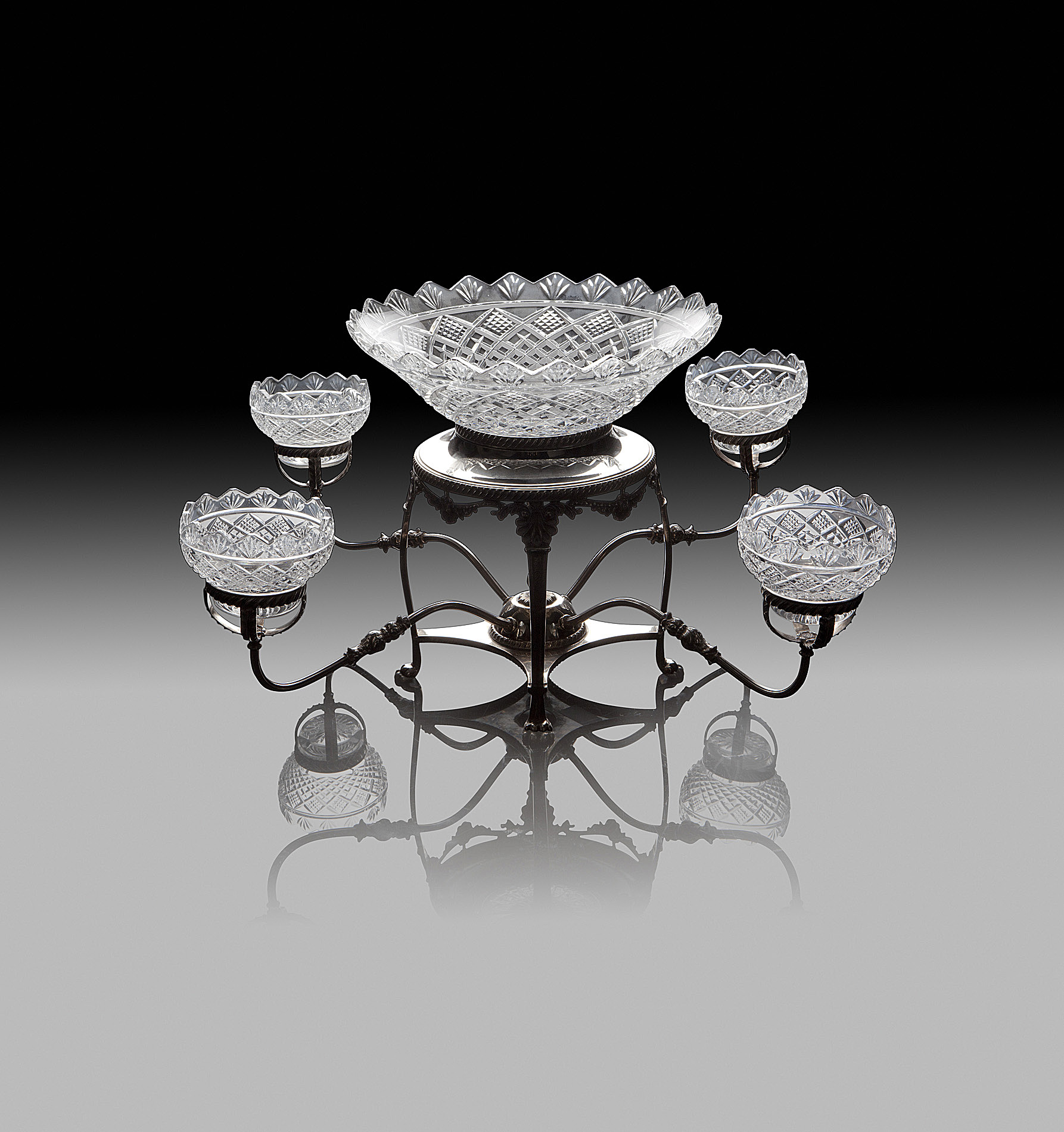 EDWARDIAN SILVER PLATED AND CUT GLASS EPERGNE