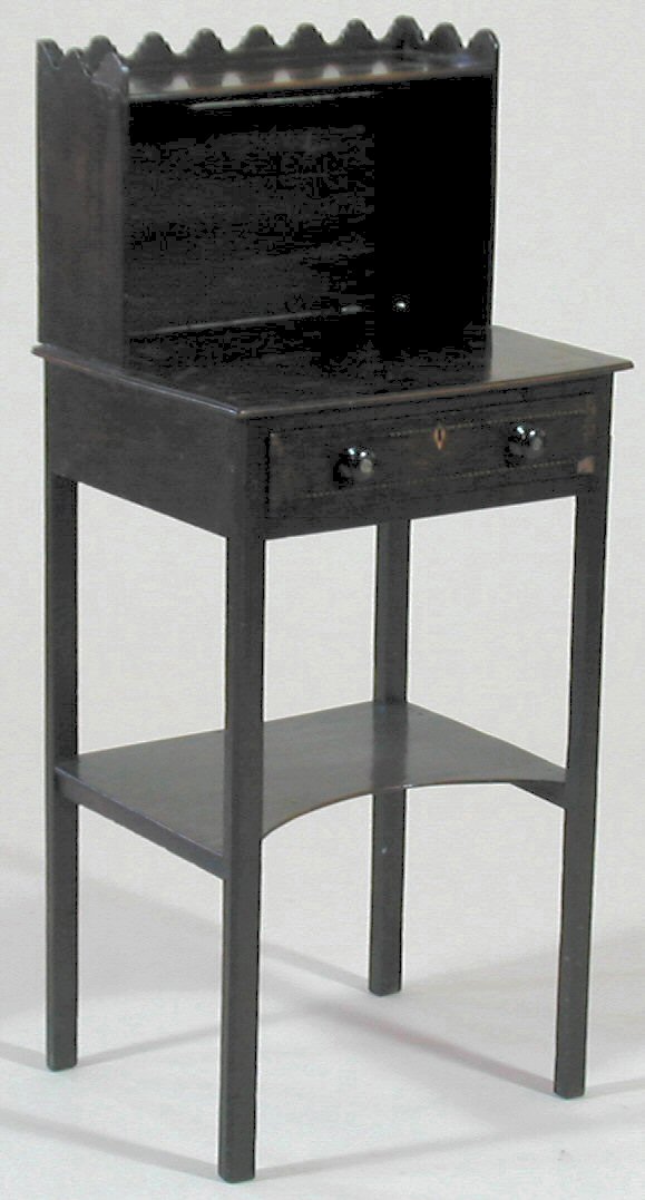 An early 19th century mahogany and chequer strung ladies writing desk,