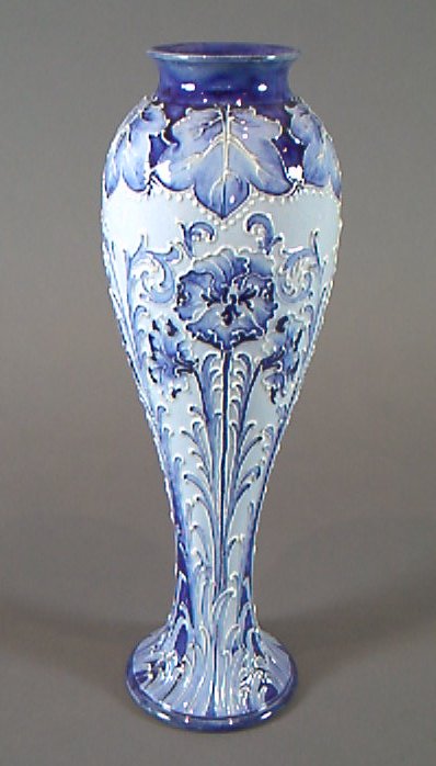 A Florian Ware tall baluster vase