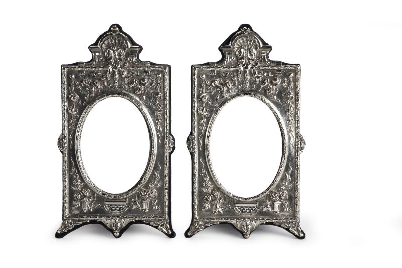 A pair of Britannia standard silver photograph frame