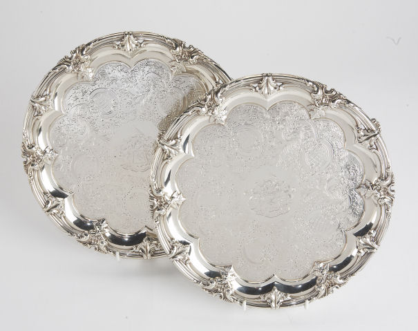 A pair of George IV circular silver salvers