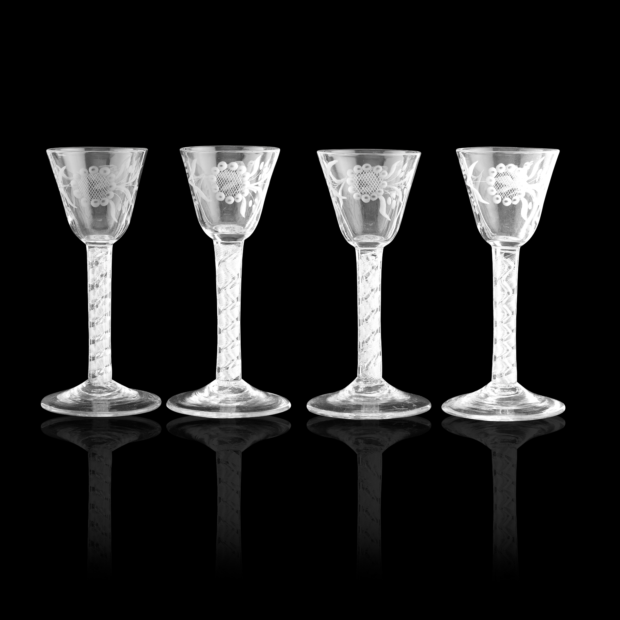 A SET OF FOUR ENGRAVED AIR TWIST JACOBITE GLASSES