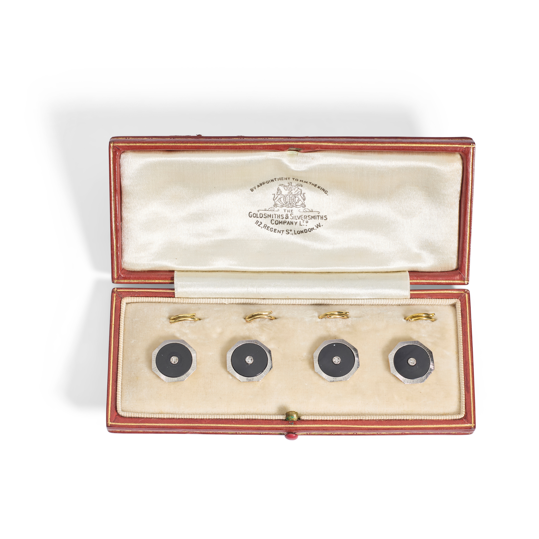 A cased set of early 20th century onyx and diamond buttons