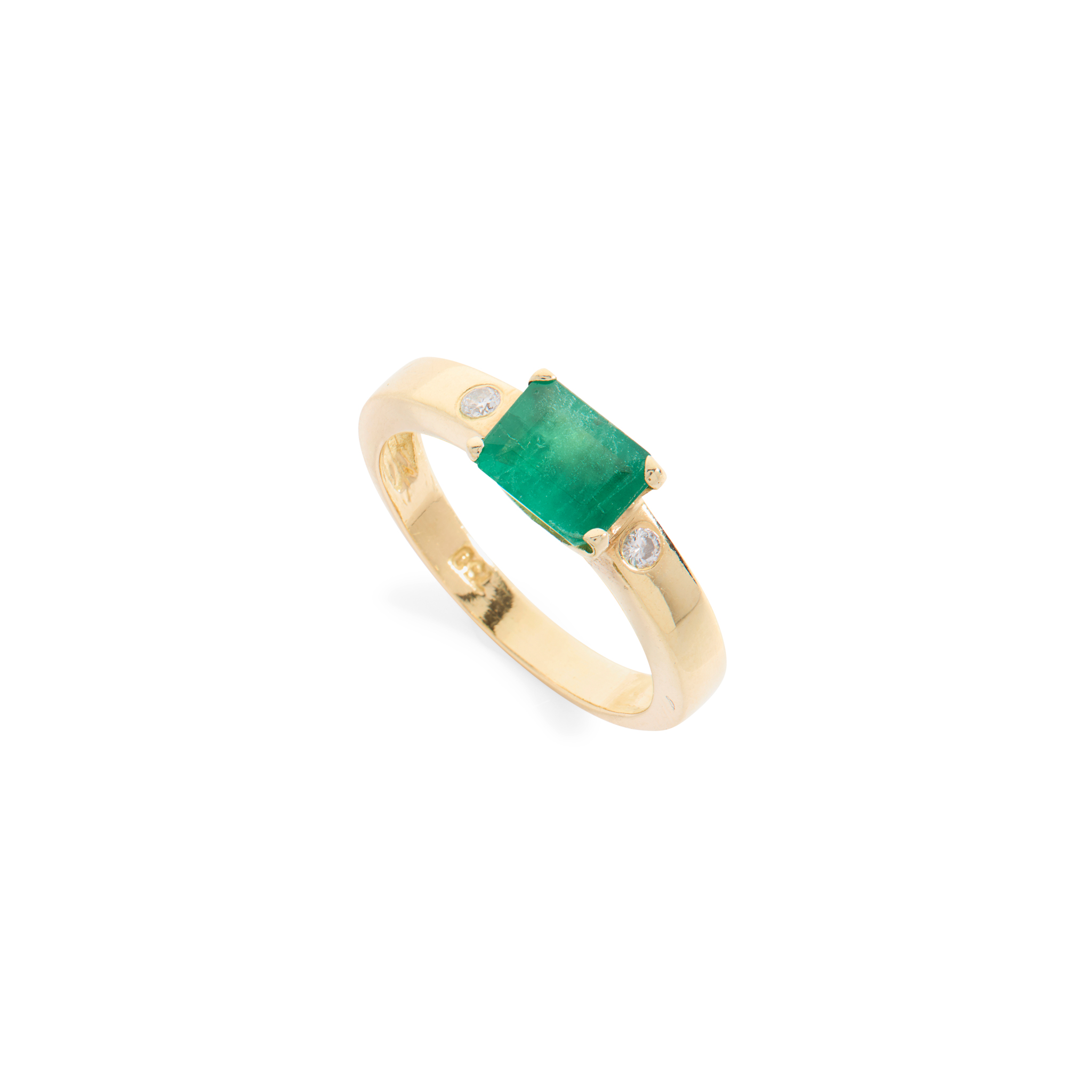 An emerald and diamond ring