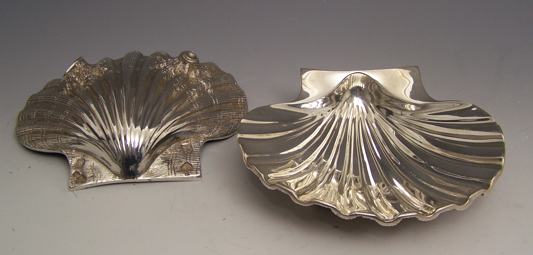 A pair of modern shell dishes,